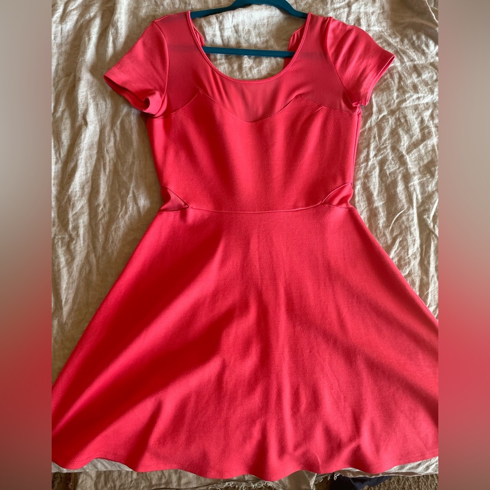 Bright orange skater dress